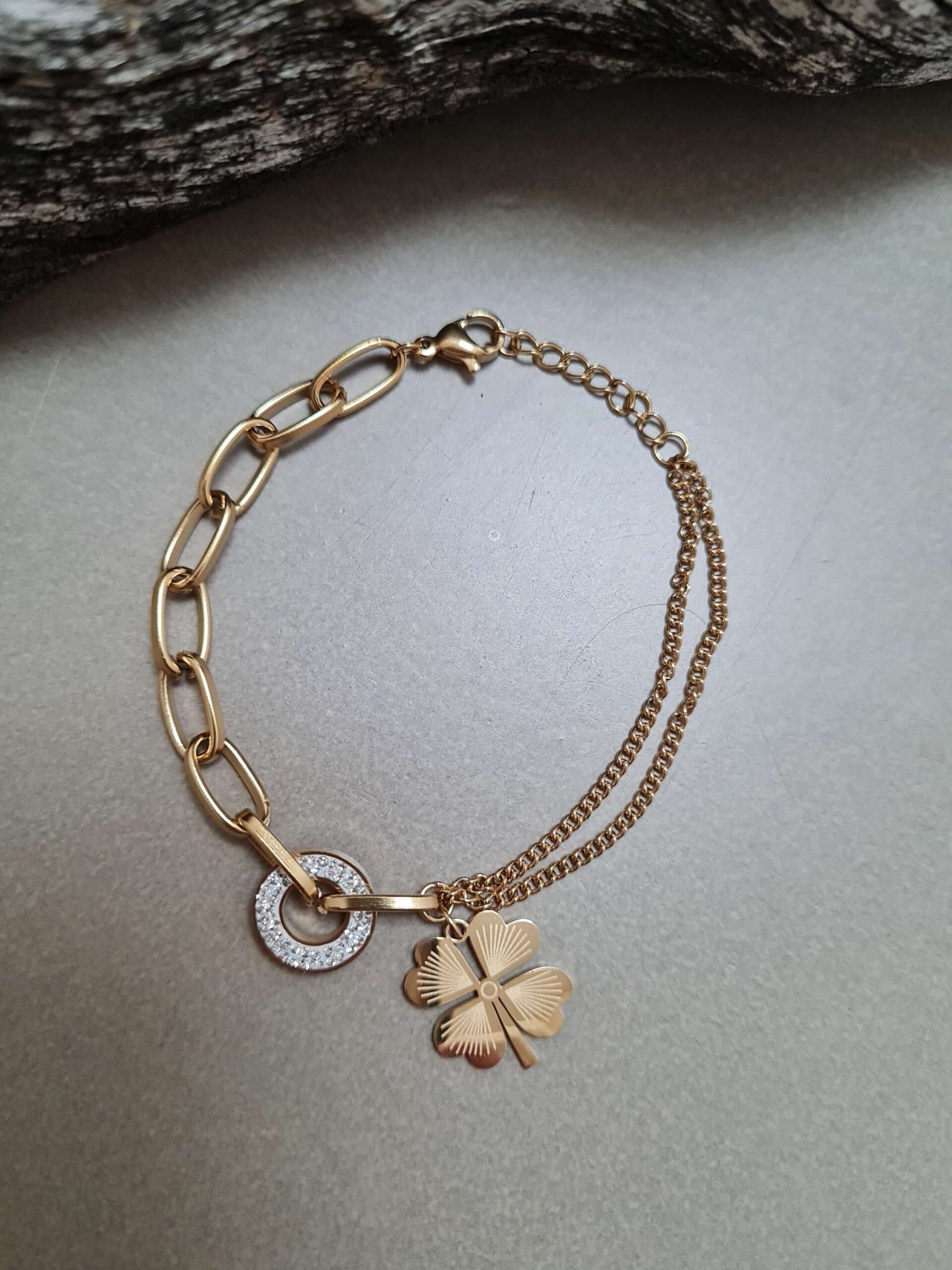 Gouden armband met cristal en klaver
